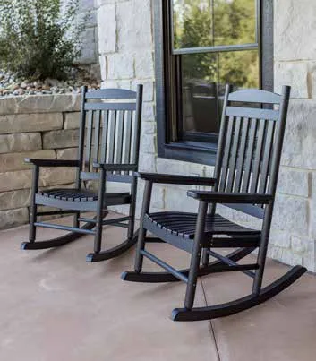 Berlin Gardens Casual Back poly rocking chairs on a porch